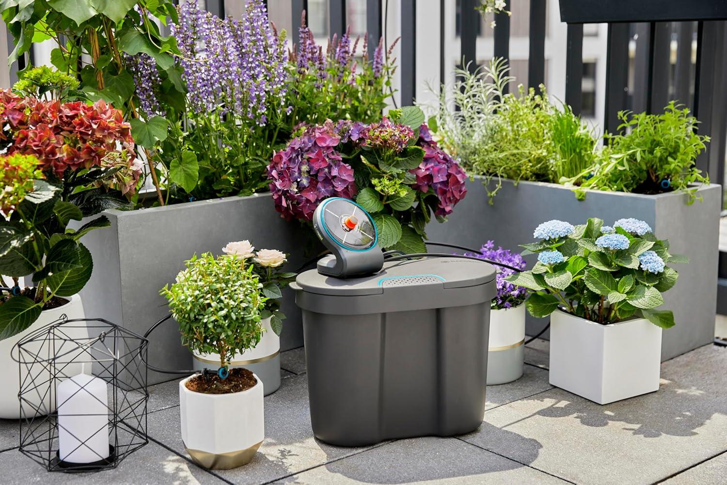 imageGARDENA 13301 SolarPowered AquaBloom Garden Irrigation Sprinkler Kit with Water Tank Water up to 20 Potted Plants with Adjustable drip Irrigation System for Automatic Watering of Patio PlantsM 21 Plants