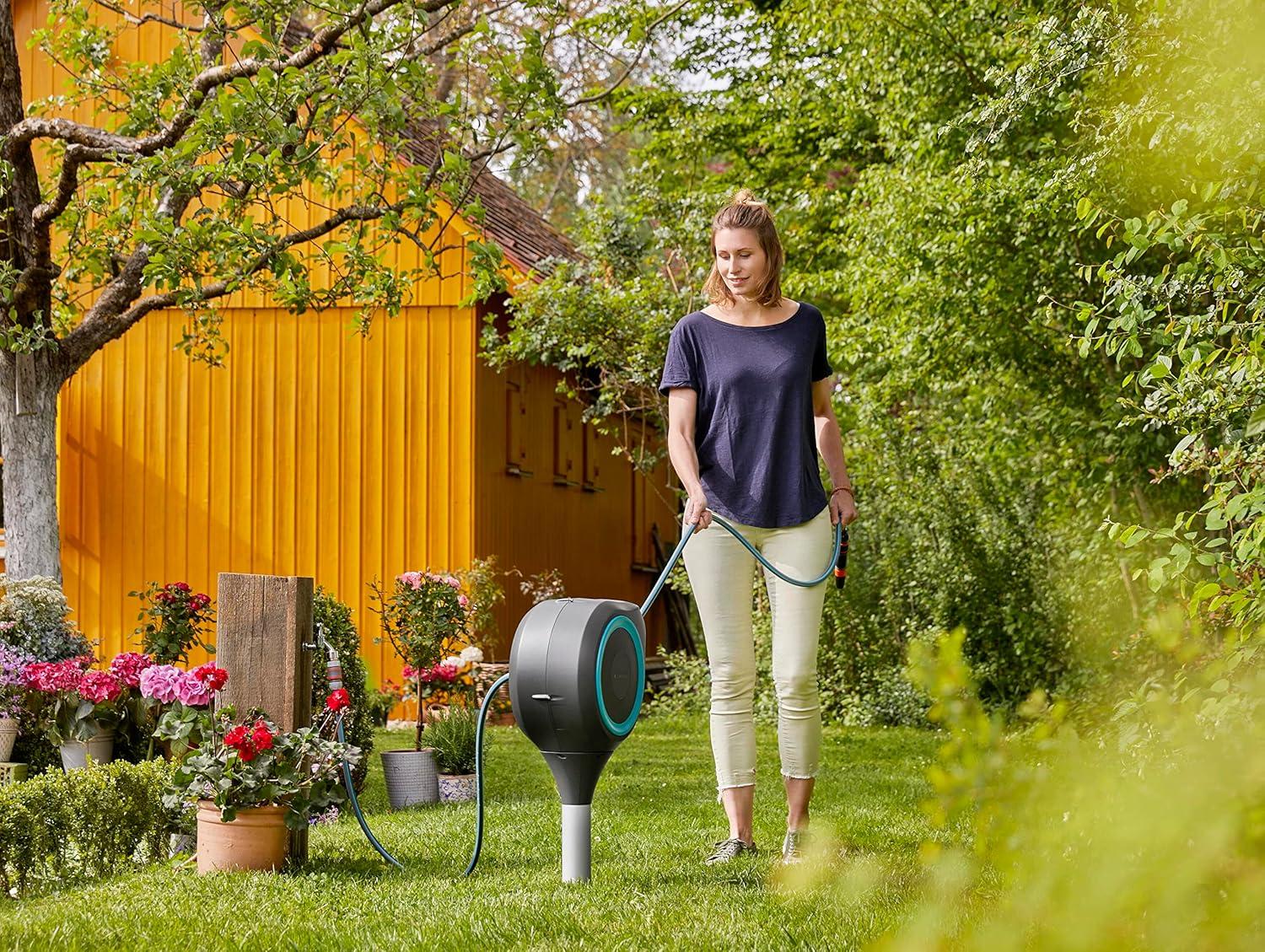 imageGARDENA 18614 66 x 12quot Automatic Retractable Garden Hose Reel on Metal Spike Outside Garden Hose with 360 swivel No Holes in your house Easy Installation No Tools Required50 ft