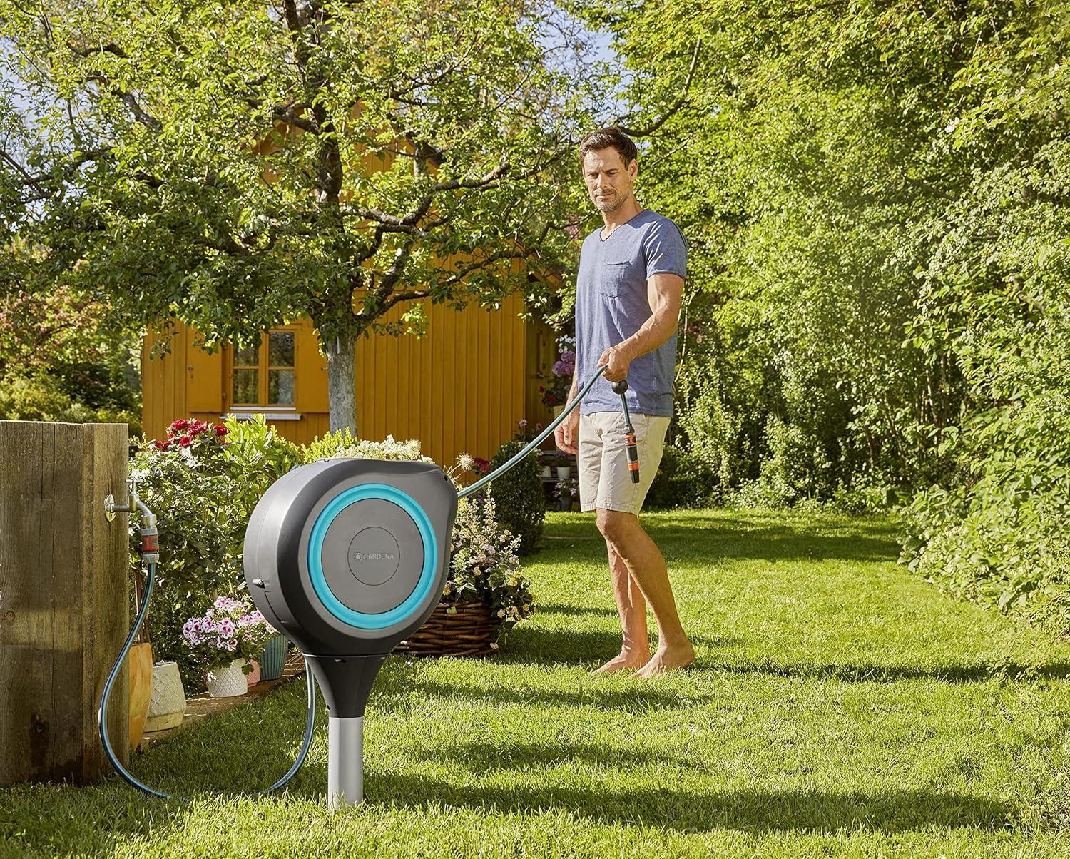 imageGARDENA 18614 66 x 12quot Automatic Retractable Garden Hose Reel on Metal Spike Outside Garden Hose with 360 swivel No Holes in your house Easy Installation No Tools Required66 ft