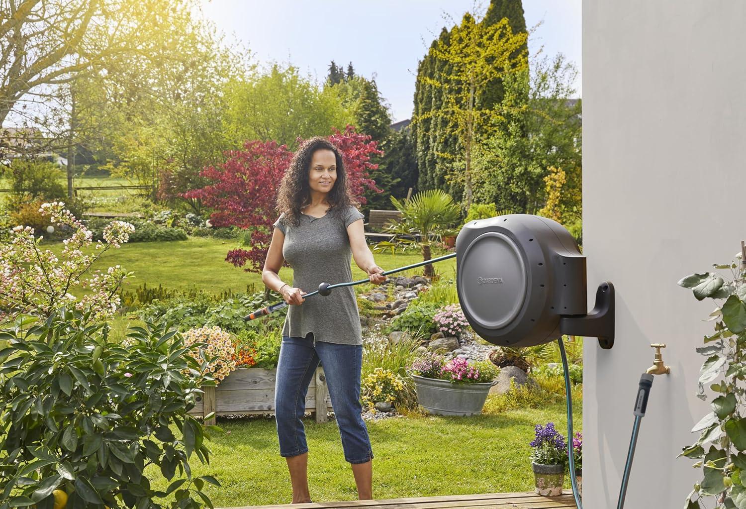 imageGARDENA 18630 Retractable Garden Hose Reel 115 x 12quot Wall Mounted Automatic Retraction ampamp Length Lock for Easy Watering Heavy Duty Swivel Bracket 180 Includes Nozzle Made in Europe75 ft