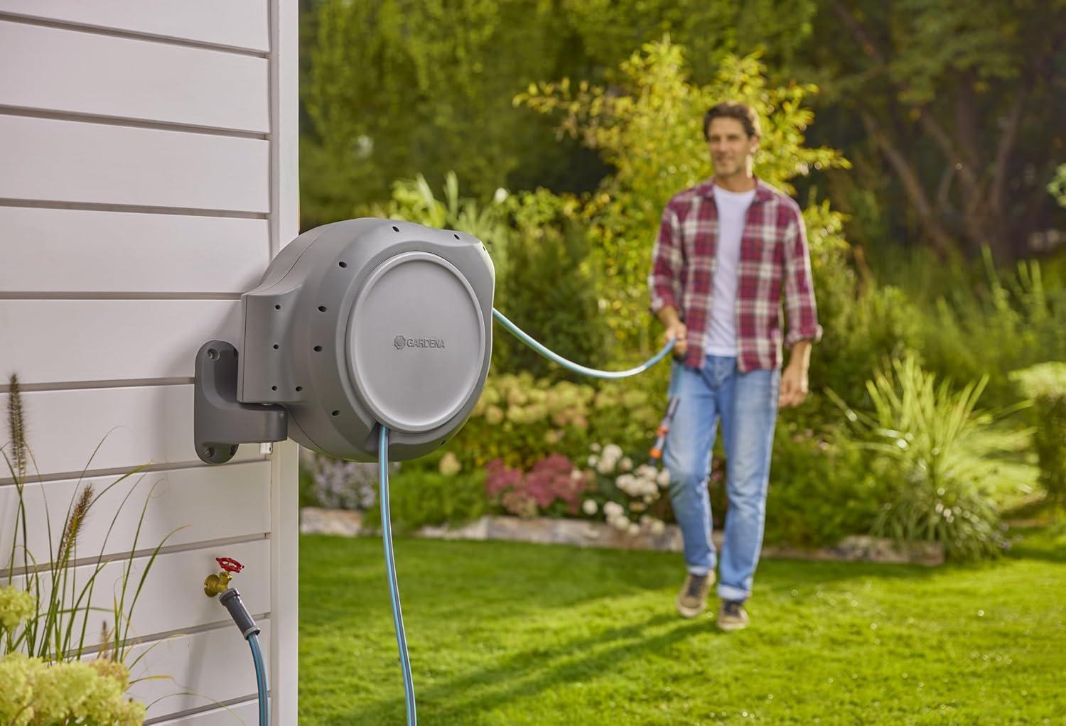 imageGARDENA 18630 Retractable Garden Hose Reel 115 x 12quot Wall Mounted Automatic Retraction ampamp Length Lock for Easy Watering Heavy Duty Swivel Bracket 180 Includes Nozzle Made in Europe50 ft
