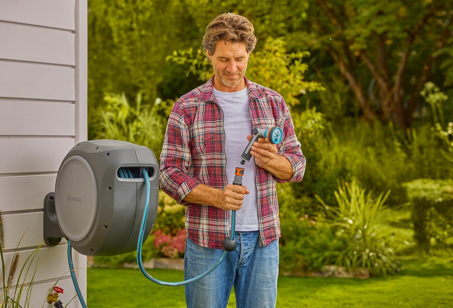 imageGARDENA 18630 Retractable Garden Hose Reel 115 x 12quot Wall Mounted Automatic Retraction ampamp Length Lock for Easy Watering Heavy Duty Swivel Bracket 180 Includes Nozzle Made in Europe75 ft