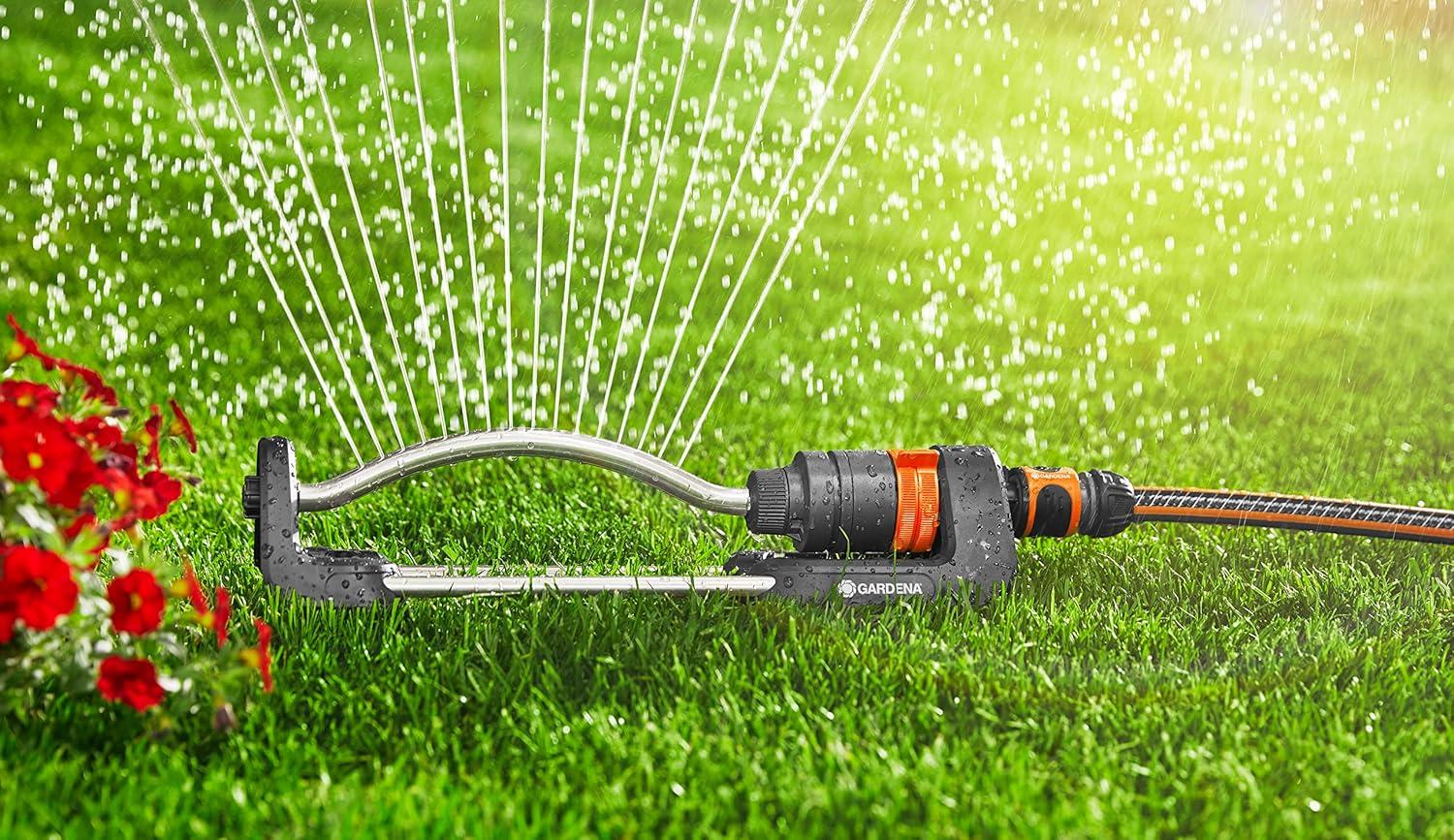 imageGARDENA 18700 Up to 2400 sq ft Adjustable Oscillating Yard Sprinkler for Watering Large Area Lawn and Garden Gardena Outdoor oscillating sprinklers Have Wide Heavy Duty Base2400 ft