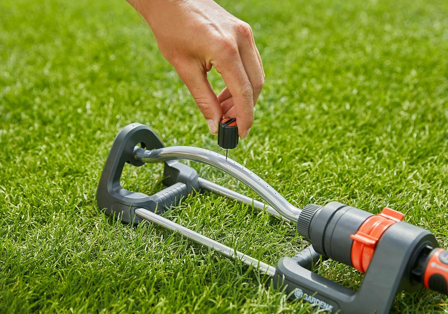 imageGARDENA 18700 Up to 2400 sq ft Adjustable Oscillating Yard Sprinkler for Watering Large Area Lawn and Garden Gardena Outdoor oscillating sprinklers Have Wide Heavy Duty Base2400 ft