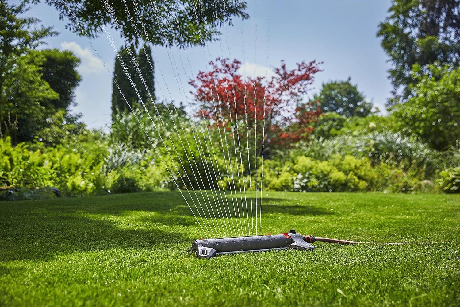 imageGARDENA 20570 Up to 3800 sq ft AquaZoom Adjustable Oscillating Yard Sprinkler for Watering Large Area Lawn and Garden Aquazoom Outdoor oscillating Sprinkler has Wide Heavy Duty Base3800 ft