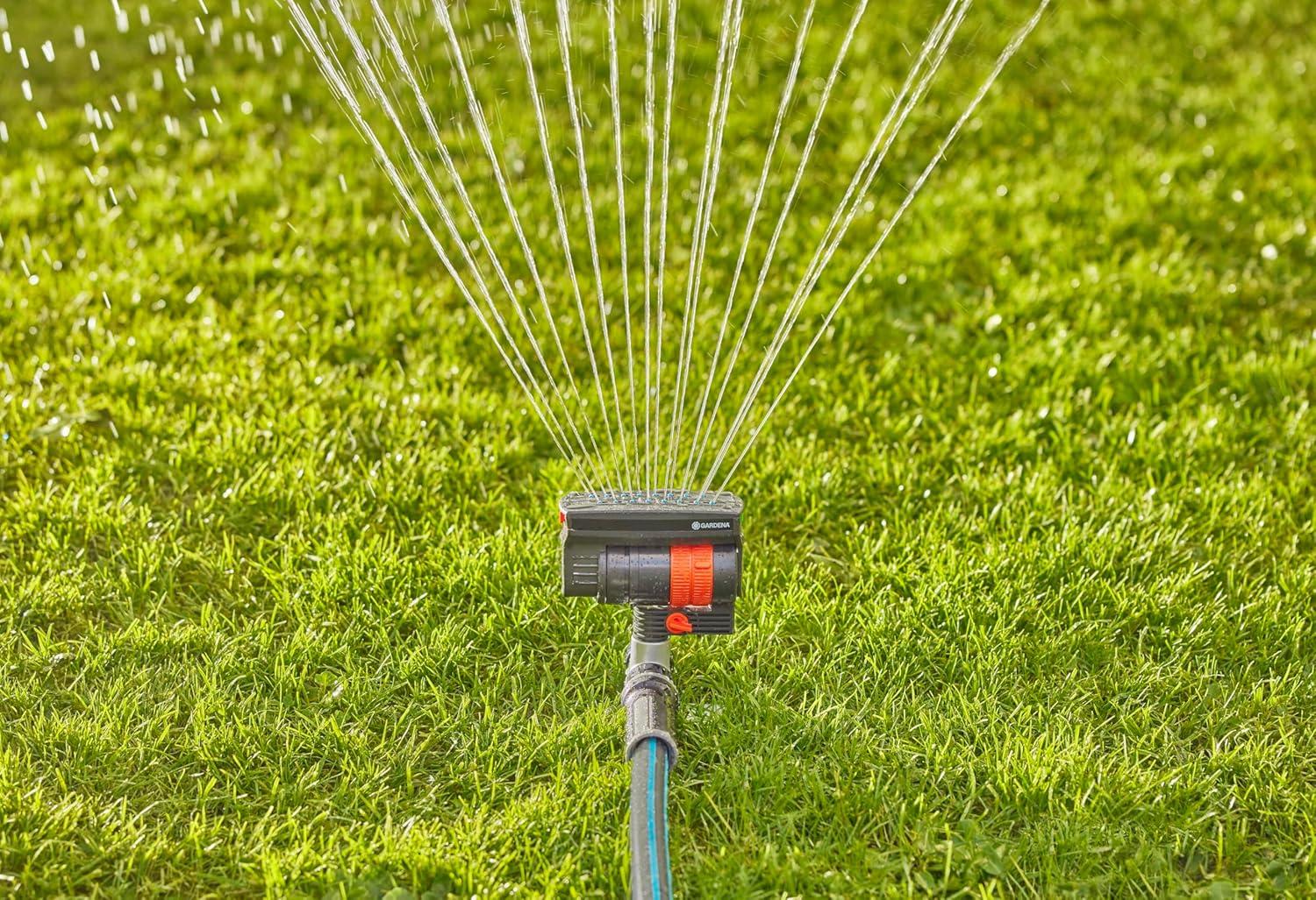 imageGARDENA 20575 Up to 2300 sq ft ZoomMaxx Adjustable Oscillating Sprinkler on Metal Step Spike for Watering Large Area Lawn with US Hose Threads Yard and Garden Gardena Quick Connects