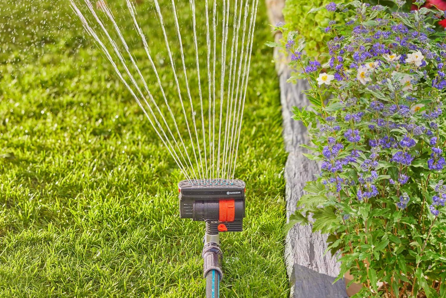 imageGARDENA 20575 Up to 2300 sq ft ZoomMaxx Adjustable Oscillating Sprinkler on Metal Step Spike for Watering Large Area Lawn with US Hose Threads Yard and Garden Gardena Quick Connects