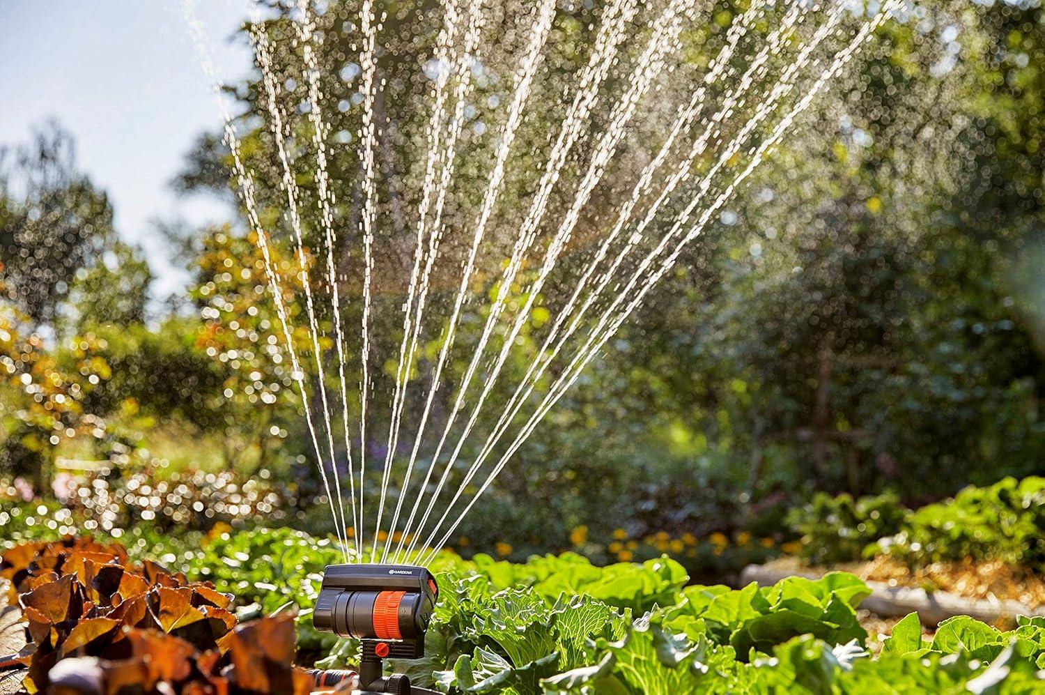 imageGardena 6984BZMX ZoomMaxx Adjustable Sprinkler with Built in Timer Weighted Base for Precise Watering up to 2300 Sq Ft Compatible with Any Hose Brand Made in Germany 5 Year WarrantyWeighted Base with Timer